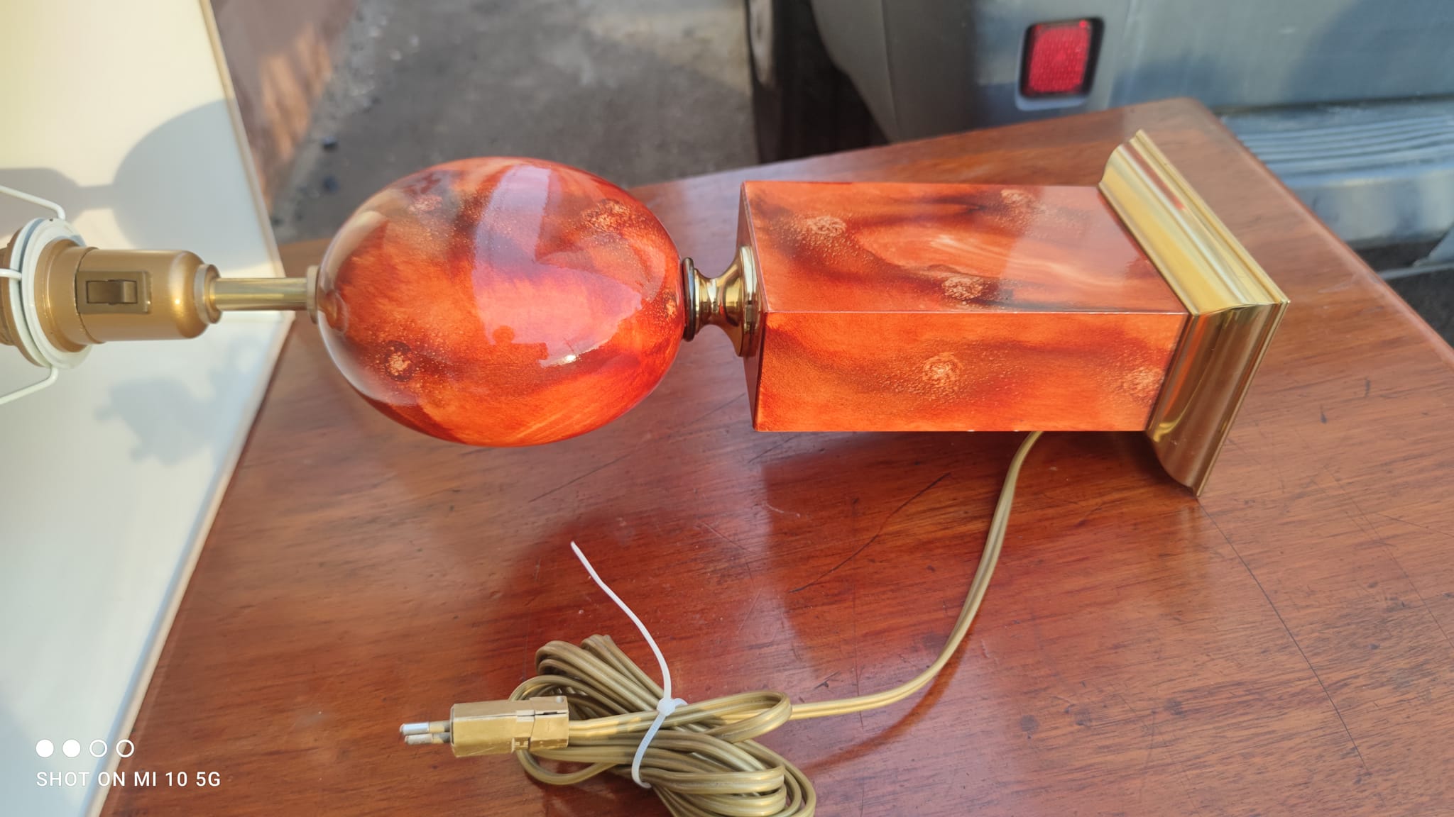 Lamp circa 1970 in iron and lacquered wood as well as bronze