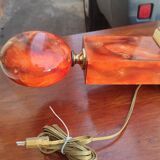 Lamp circa 1970 in iron and lacquered wood as well as bronze