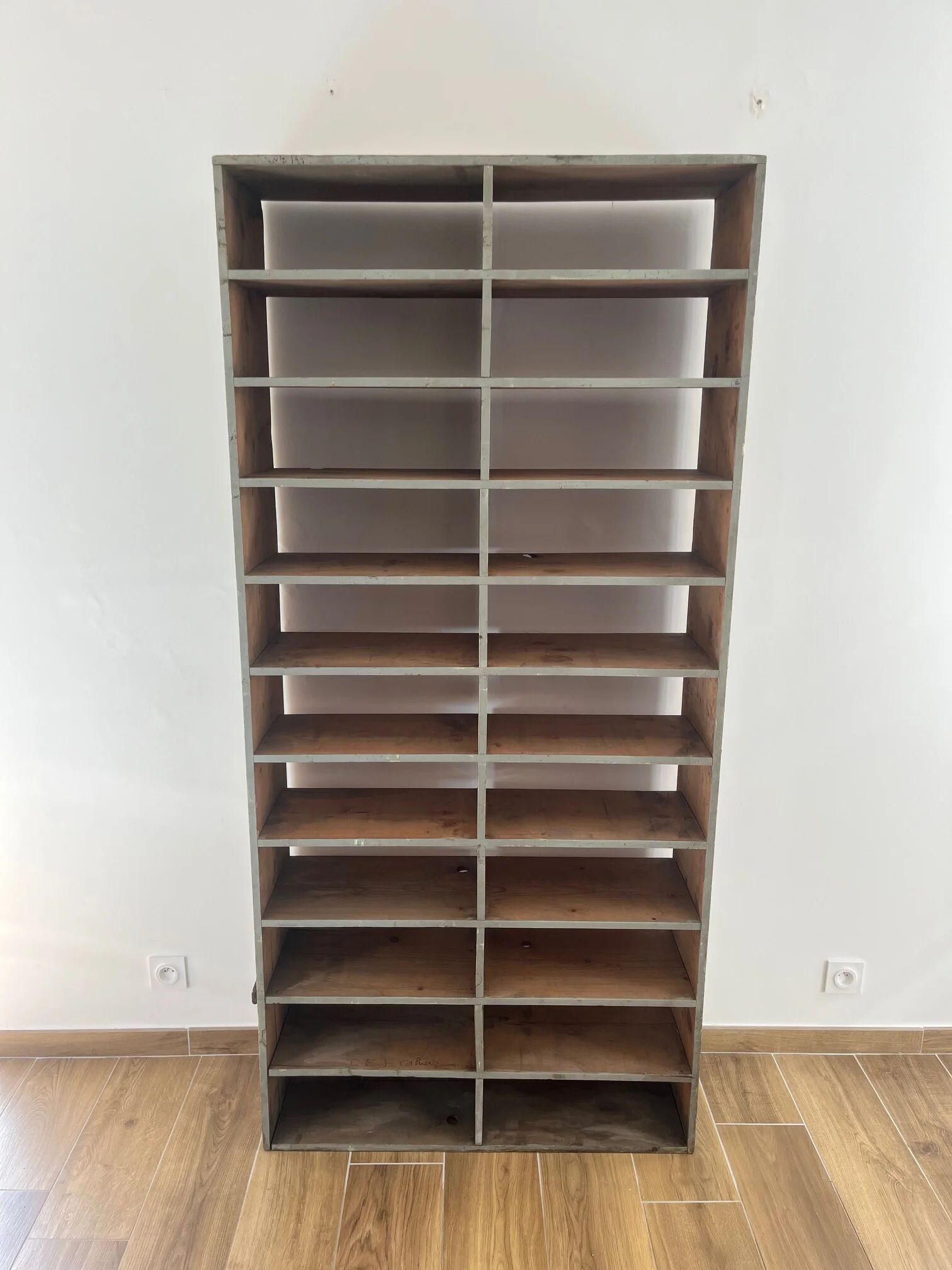 Large antique workshop cabinet with patinated wooden compartments, 20th century.