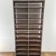 Large antique workshop cabinet with patinated wooden compartments, 20th century.