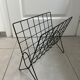 Black metal wire magazine rack