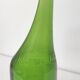 Green Negrita rum bottle atypical distorted decanter vase