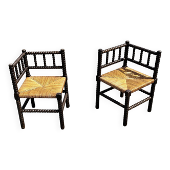 Paire de chaises fauteuils bobbin coin du feu angle
