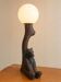 Pied de lampe en bois sculpté art déco ours