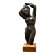 Ceramic statue with a wooden base after Giraud.