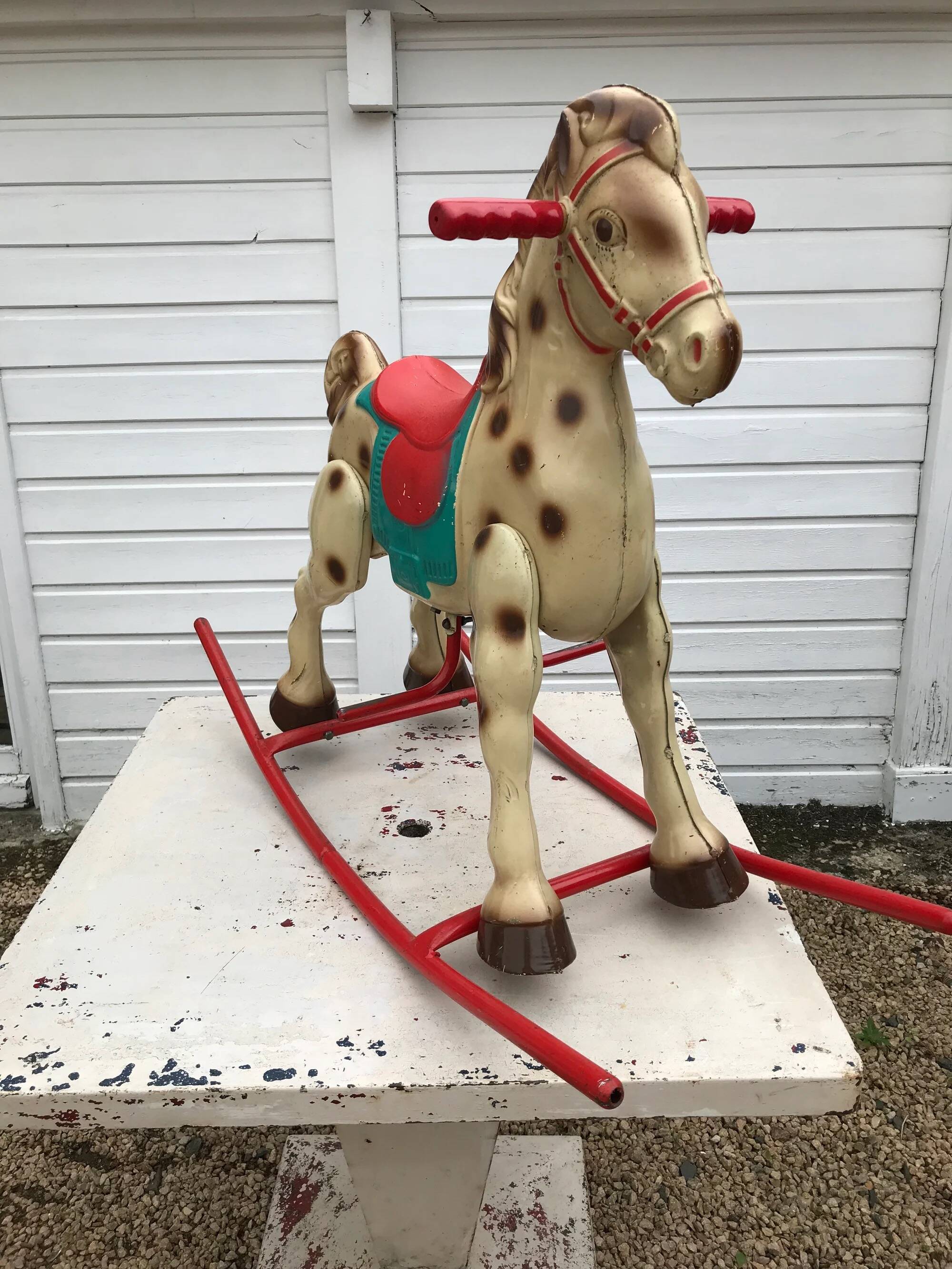Antique mobo metal rocking horse