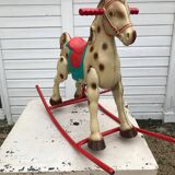Antique mobo metal rocking horse