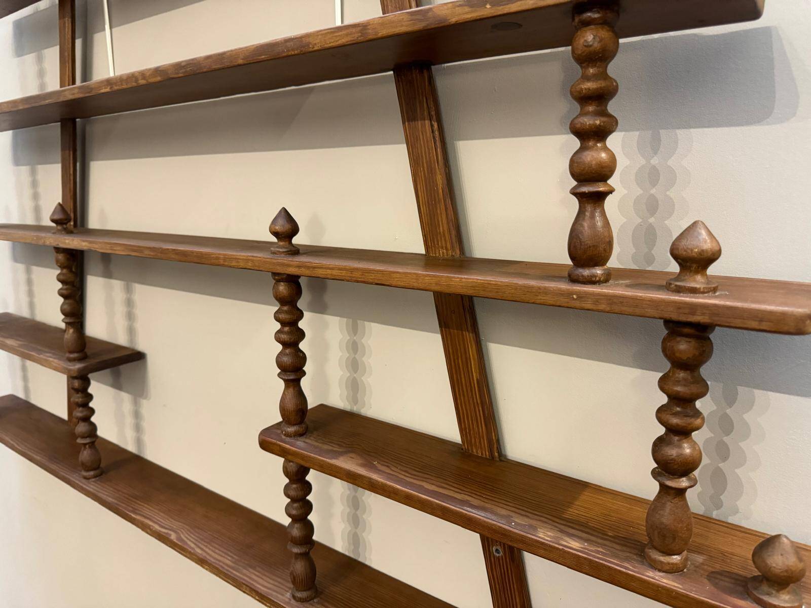 Turned wood bar wall shelf