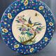 Large circular earthenware dish from Louvière with Longwy style bird decoration