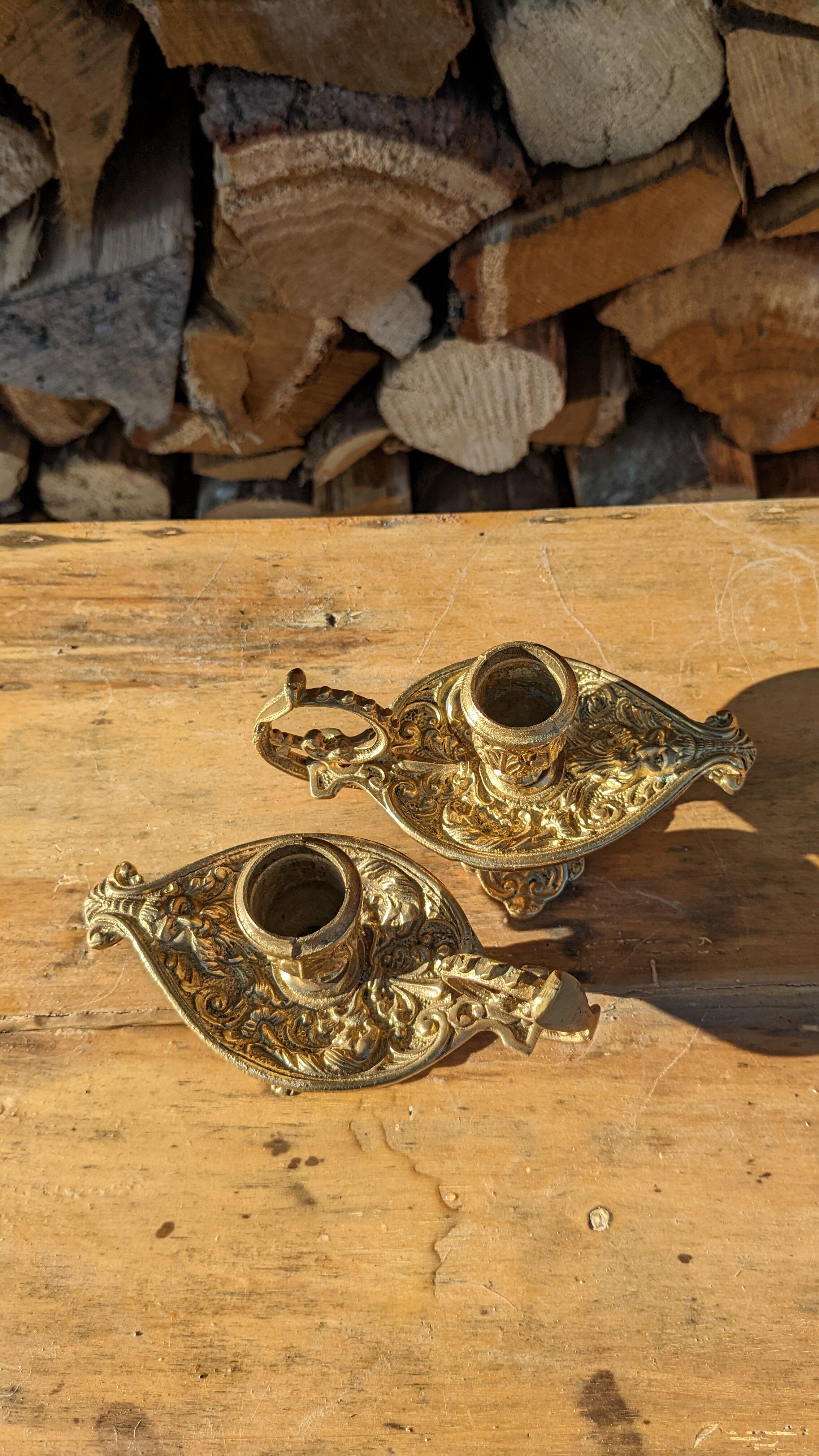 Pair of solid brass and arabesque candle holders