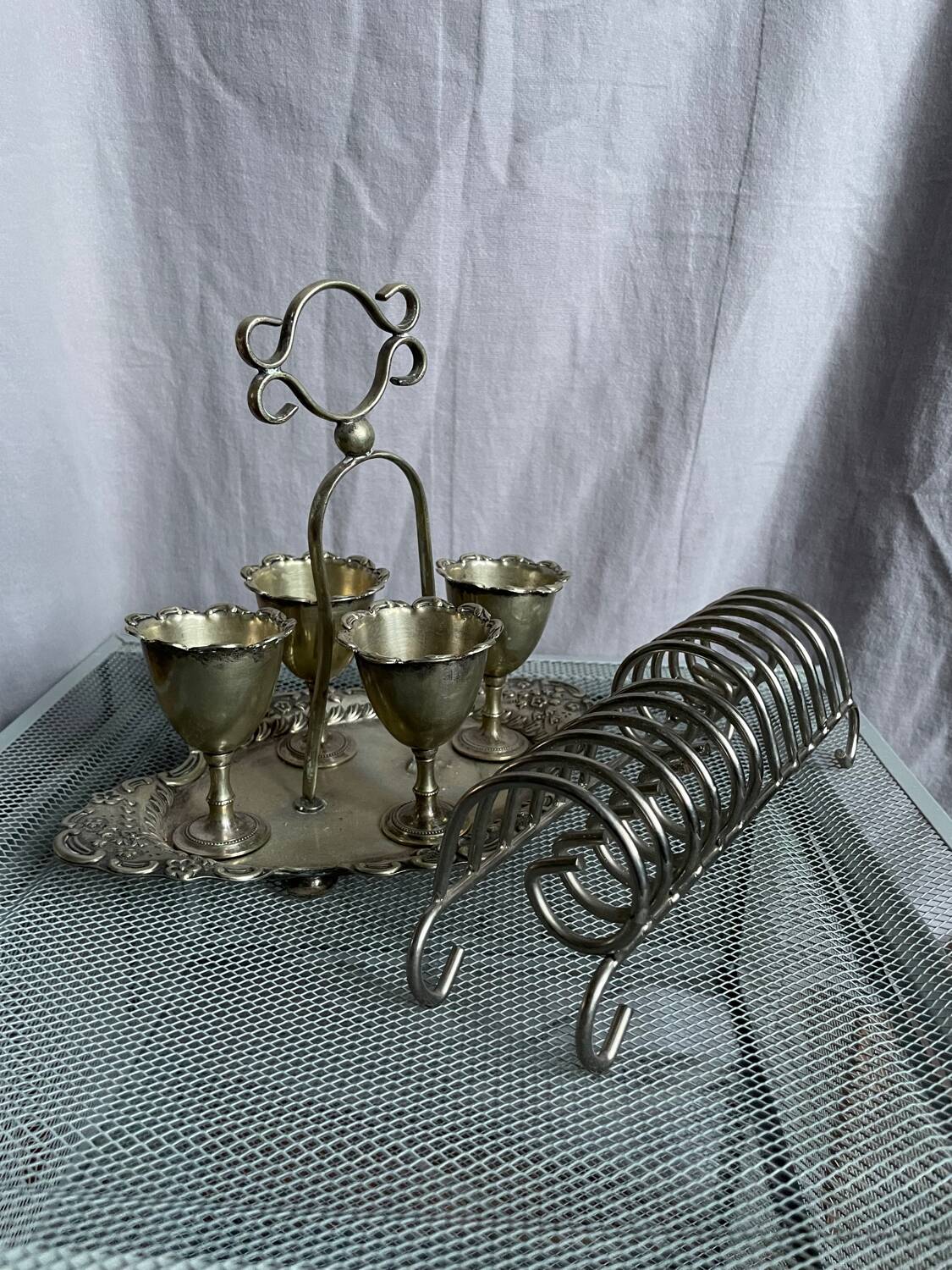 Antique egg set in nickel silver metal