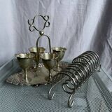 Antique egg set in nickel silver metal