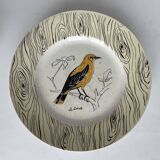 7 antique plates decorated with birds