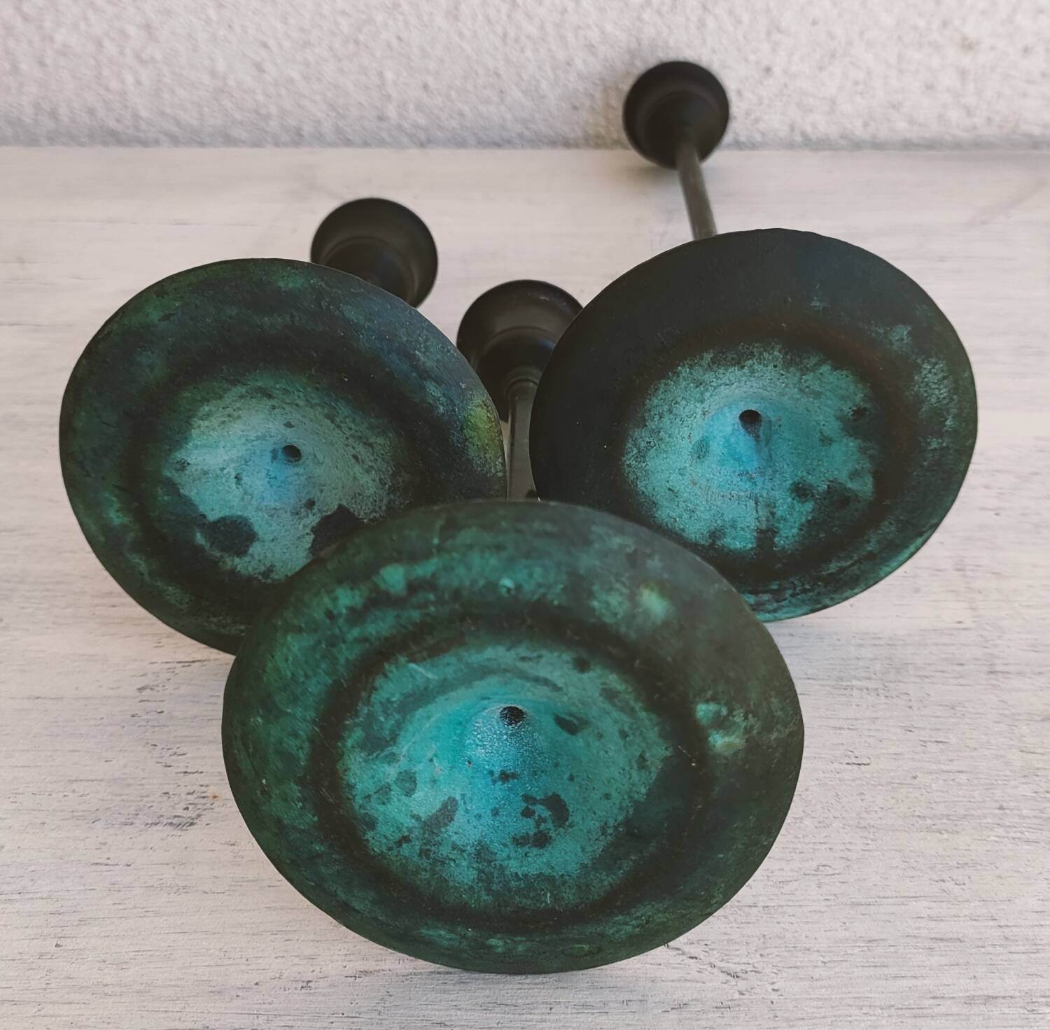 Set of 3 bronze candlesticks