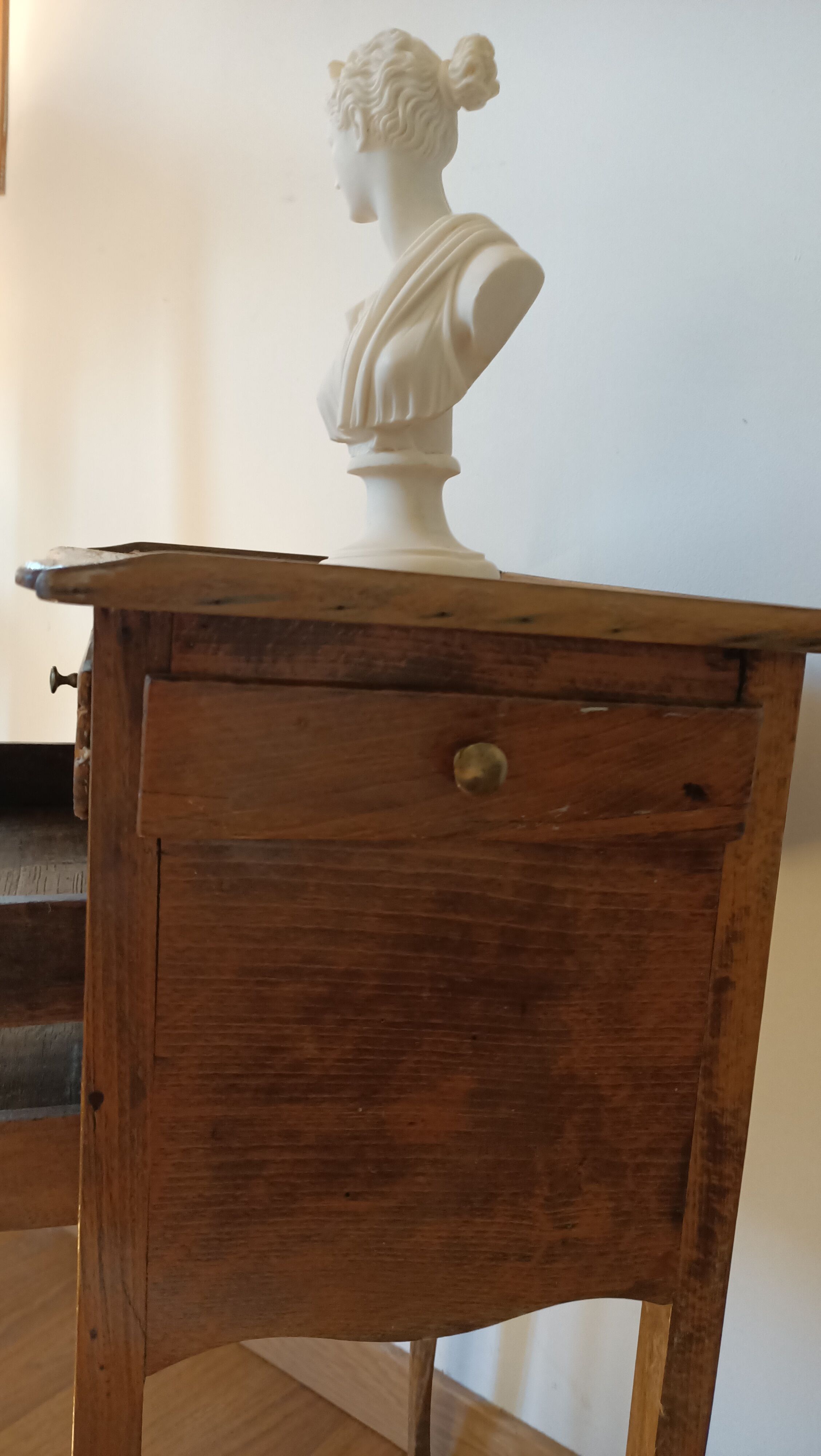 Bedside table with secret drawer