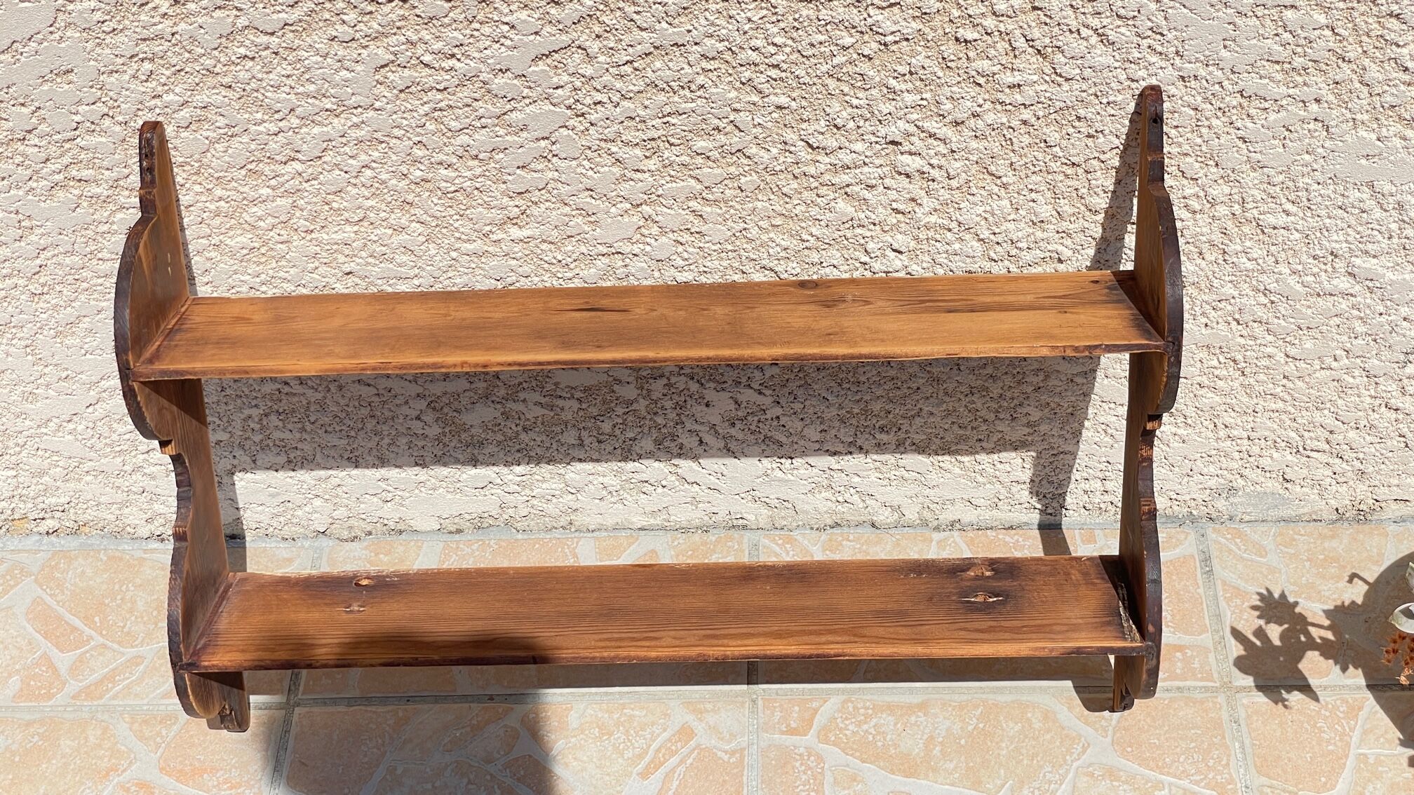 Old wall shelf in wood