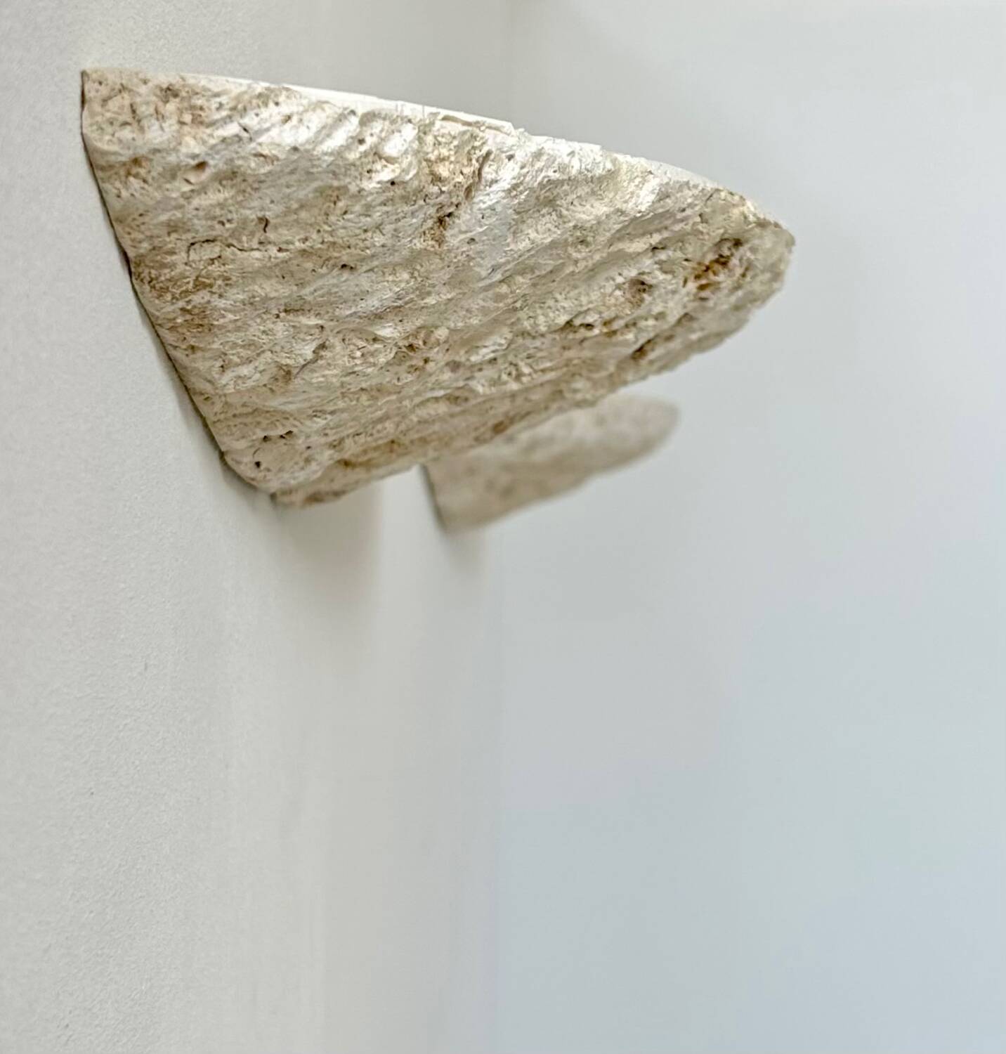 Pair of vintage stone sconces, natural beige, Italy 1979