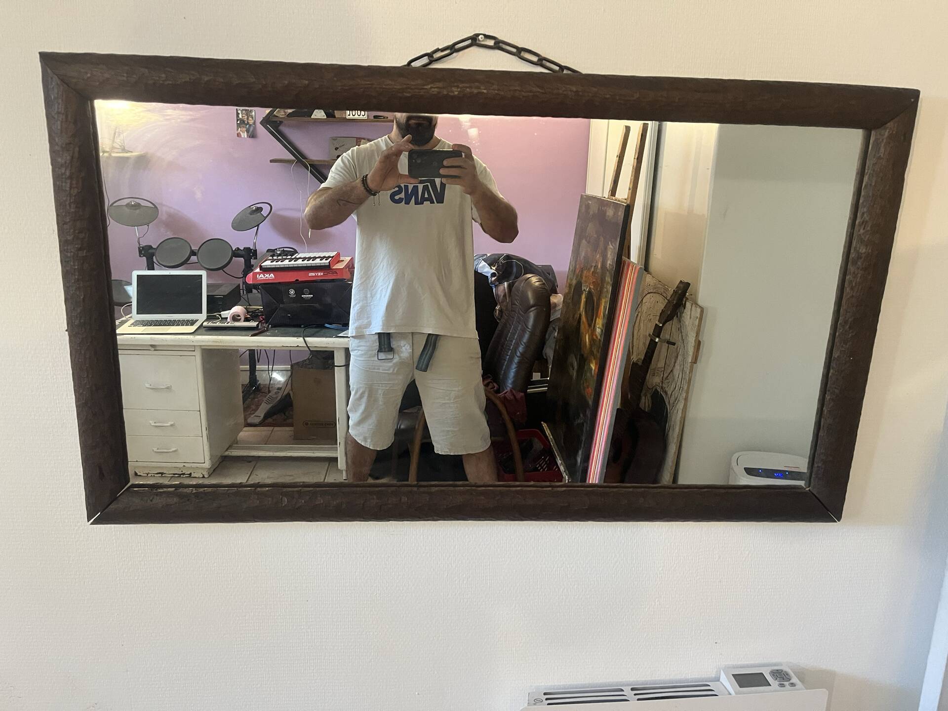 Large vintage mirror with a carved solid wood frame.