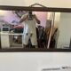 Large vintage mirror with a carved solid wood frame.