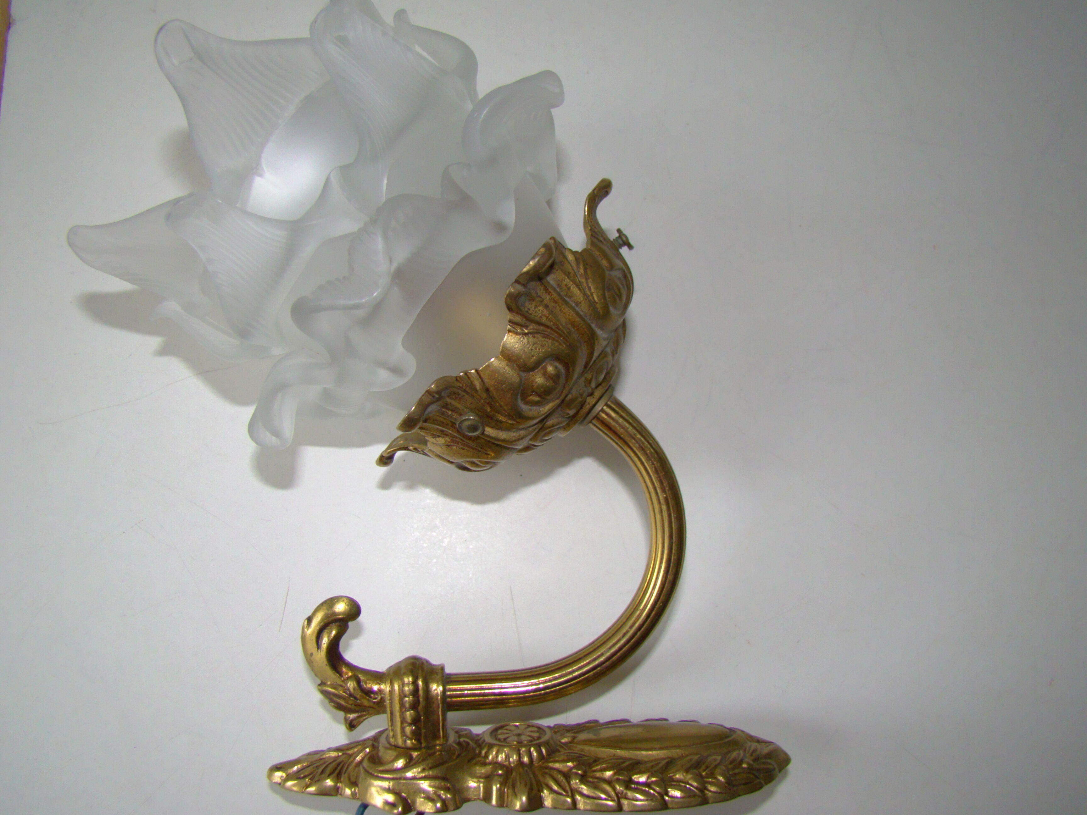 Pair of tanned sconces and glass paste