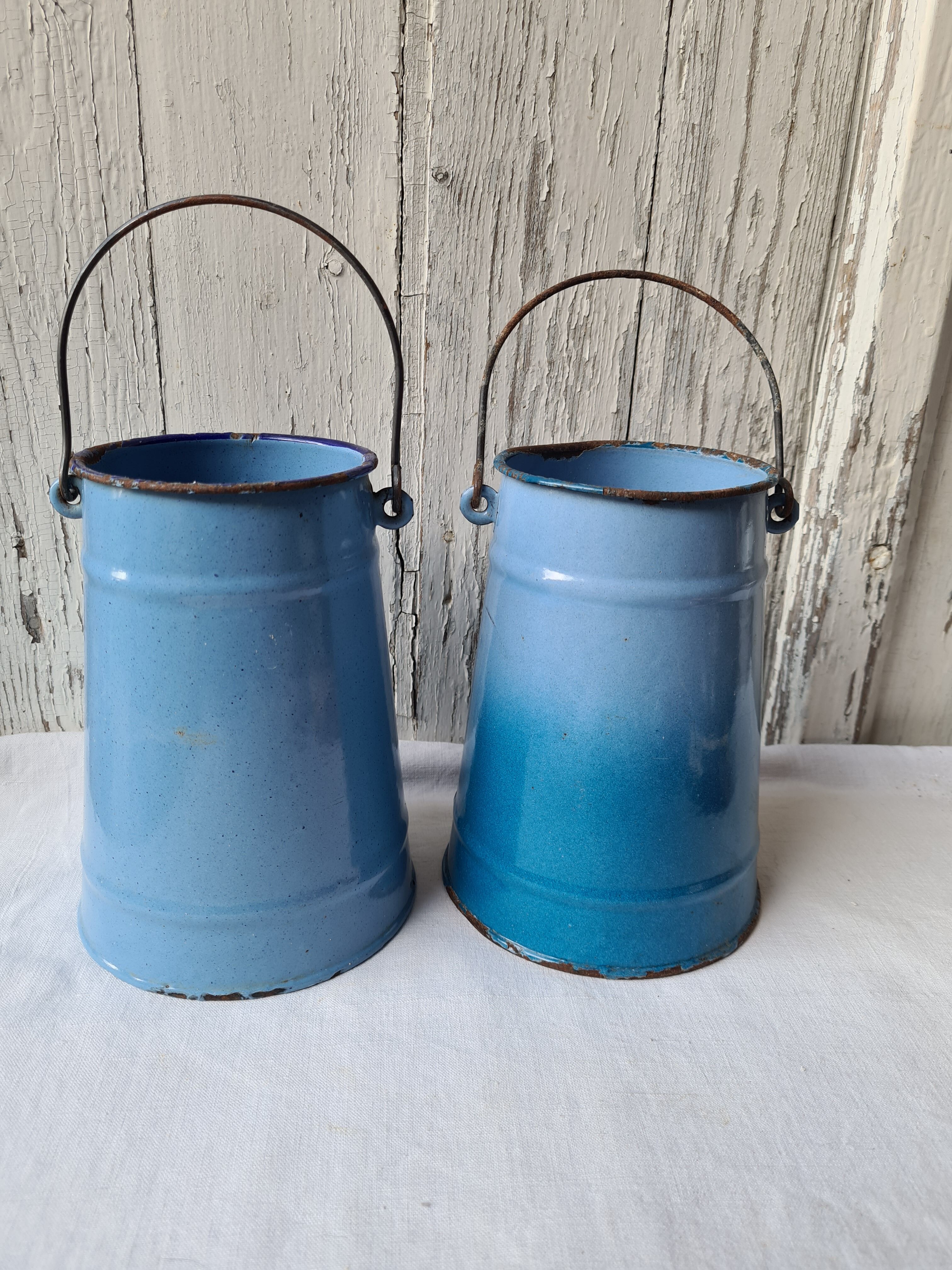 Two enamelled milk jars