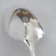 Silver metal serving spoon