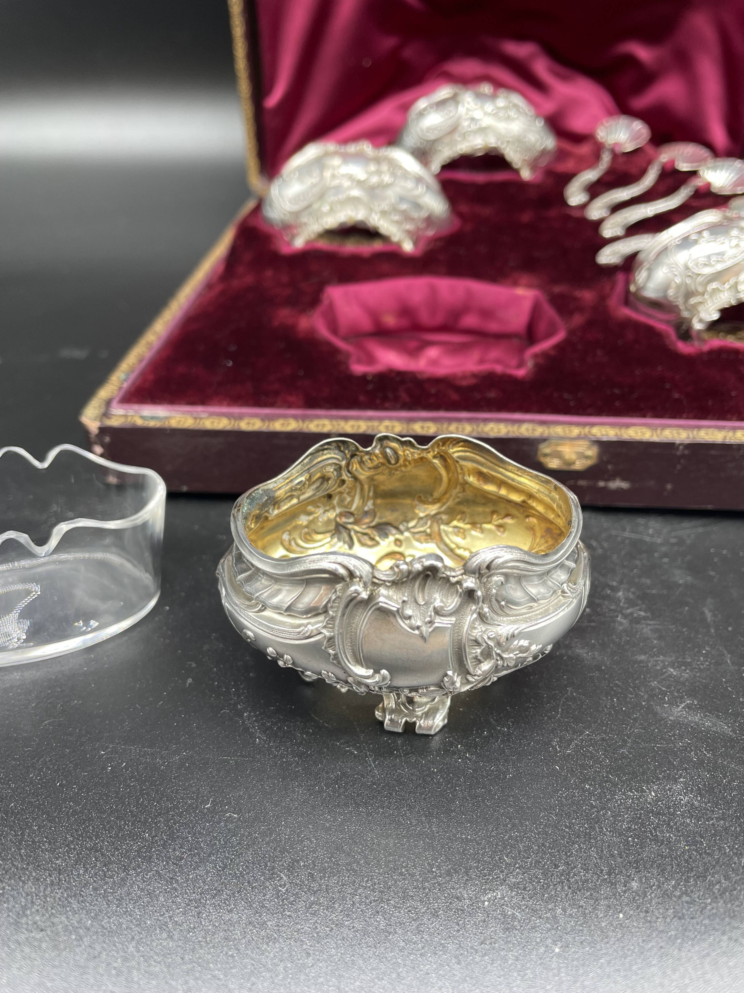 4 salt pots, silver, Ravinet D'enfert, 4 shovels, white glass interior, case, purple interior, 19th century