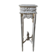 Carved wooden stool with a white patina.