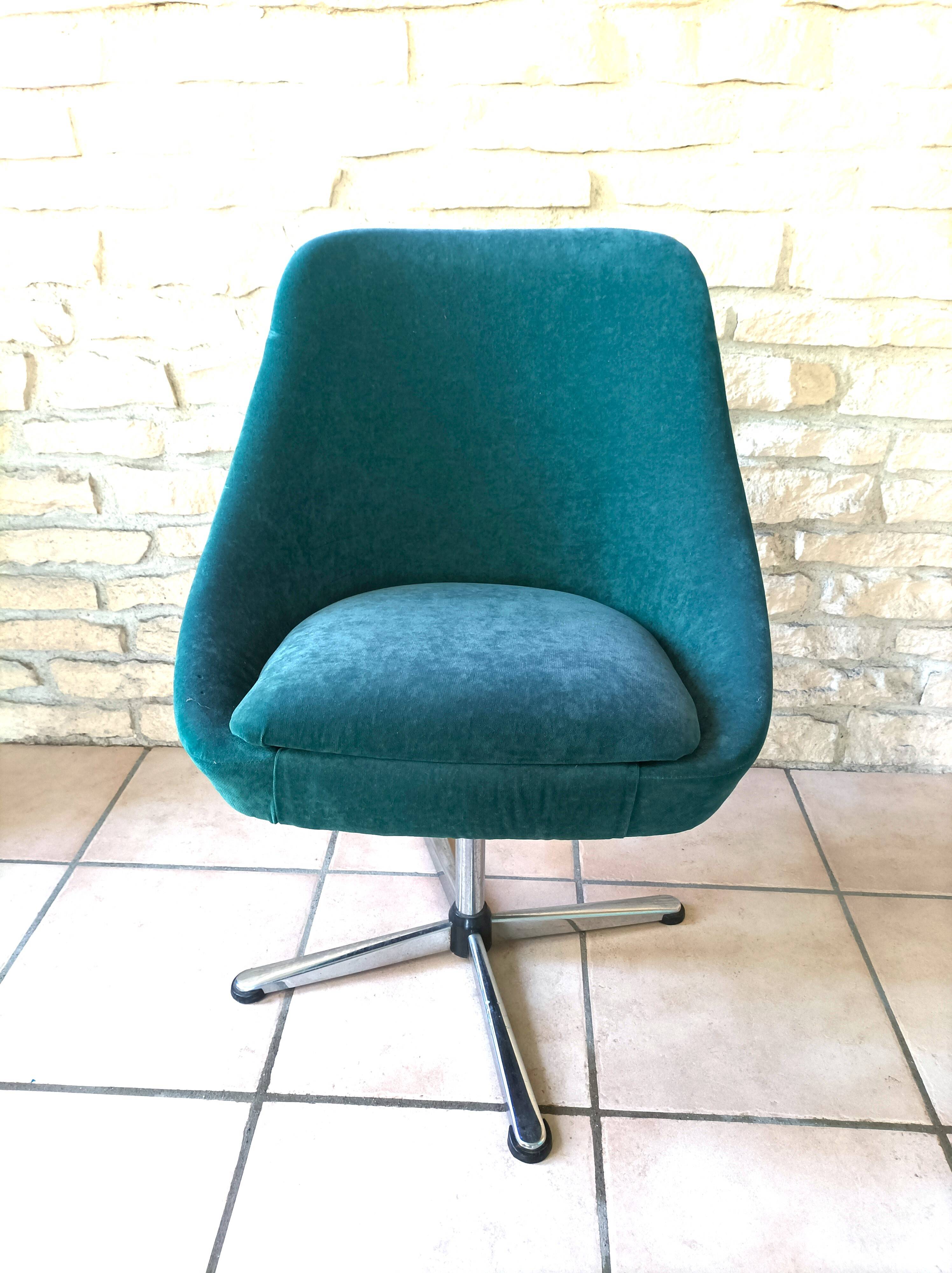 Green velvet armchair