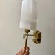 Pair of gold steel wall lamps, plexi and pleated plastic shades 60s-70s
