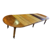 Table 6 pieds en noyer blond de 356 cm de long ouverte avec 5 allonges n10