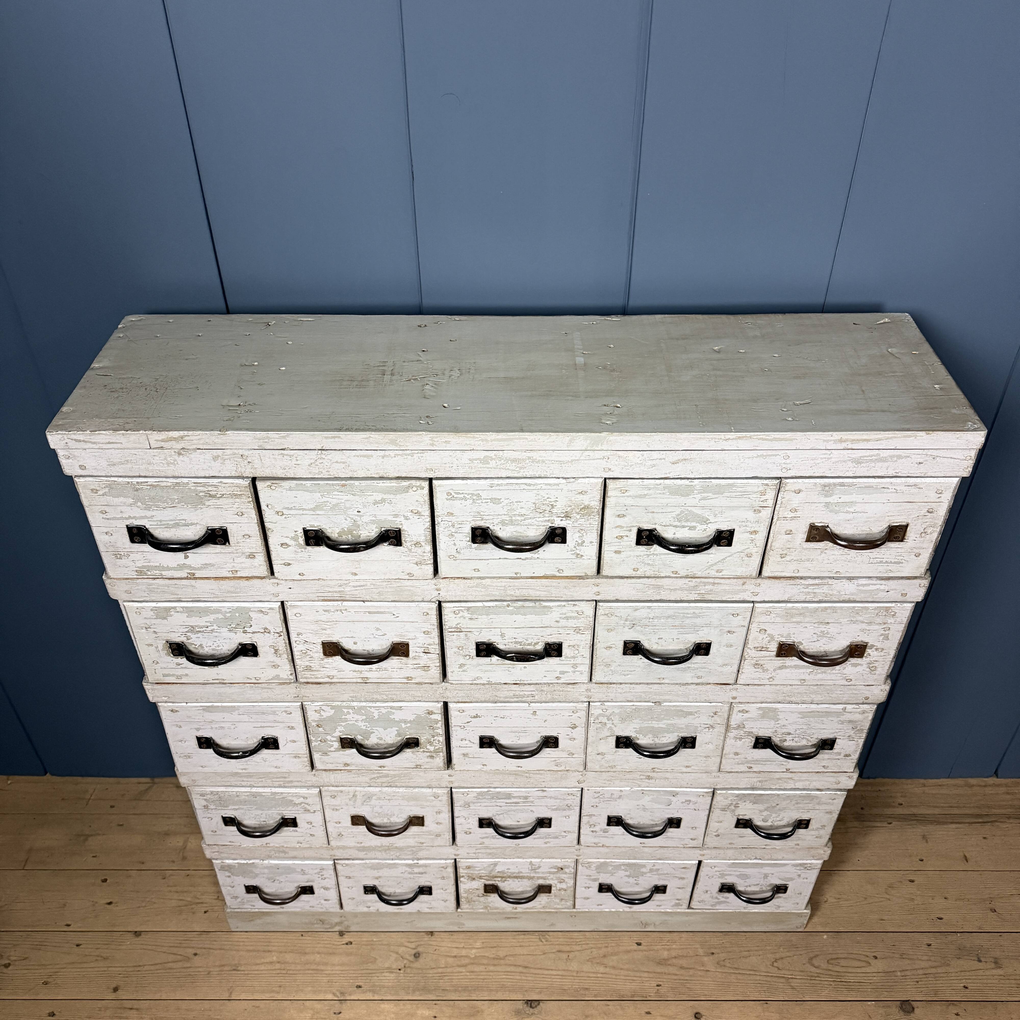 Old light grey workshop drawer cabinet with 25 drawers