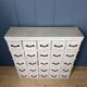 Old light grey workshop drawer cabinet with 25 drawers