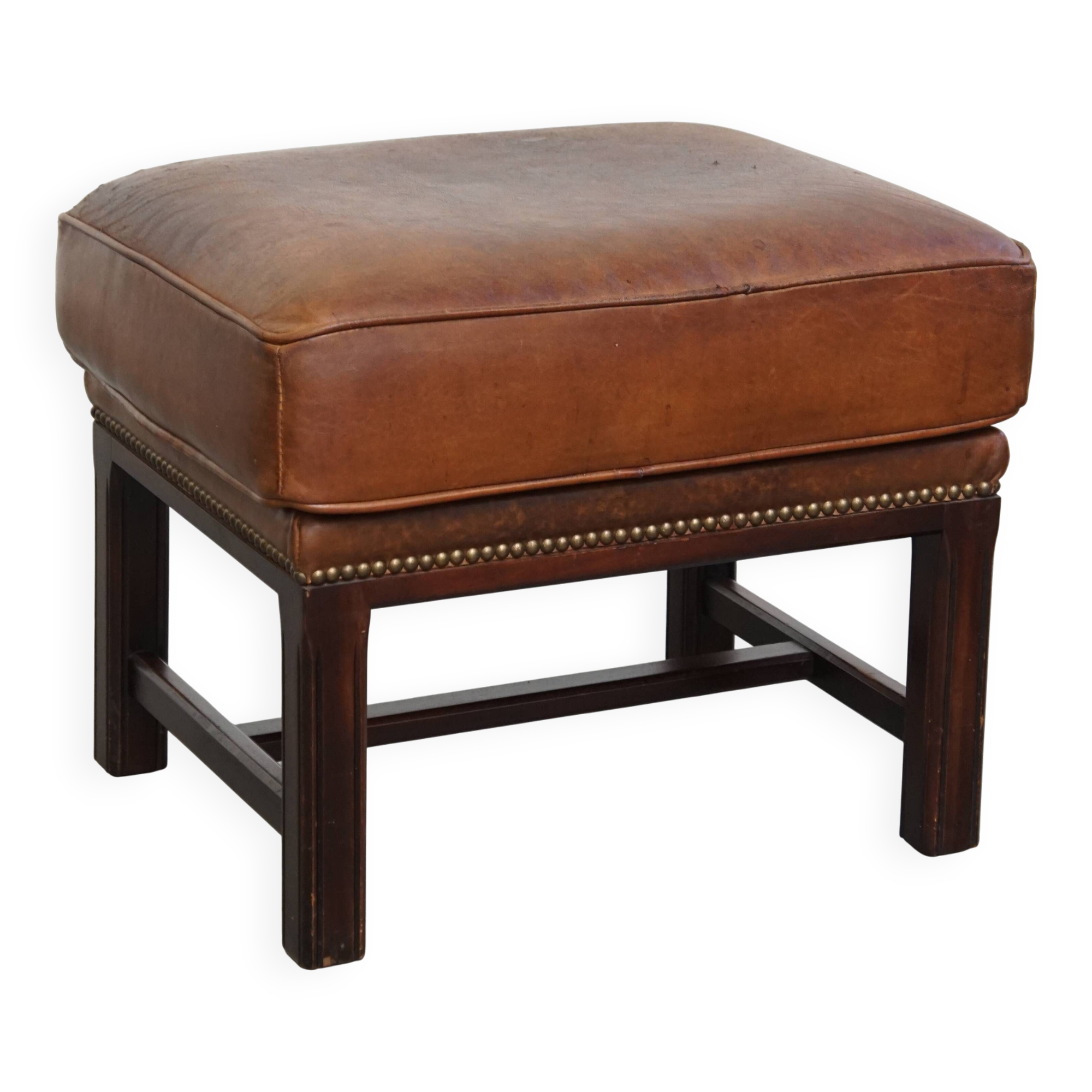 Pouf en cuir de mouton avec cadre en bois