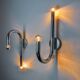 Pair of space-age tubular wall lights, chromed metal, Italy, 1970