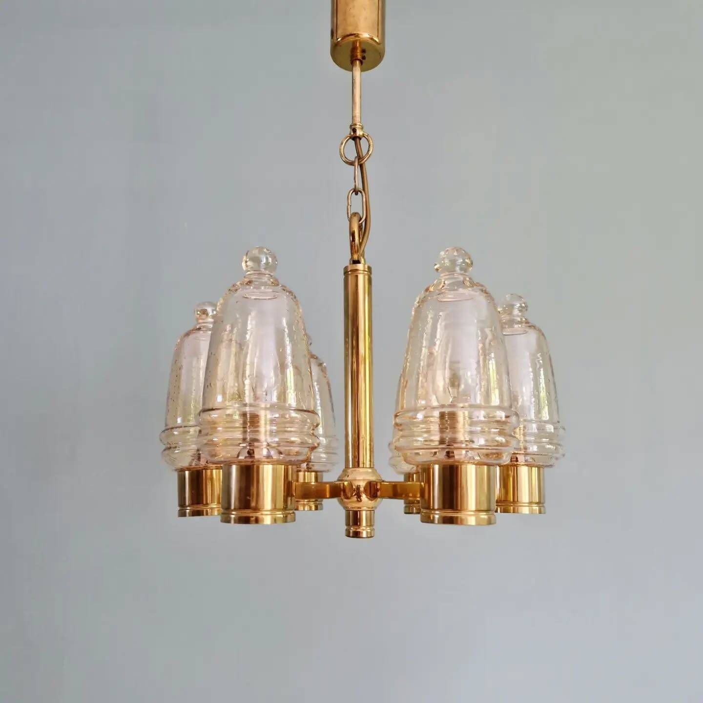 Brass chandelier with amber bubbled glass globes, 1970.