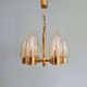 Brass chandelier with amber bubbled glass globes, 1970.