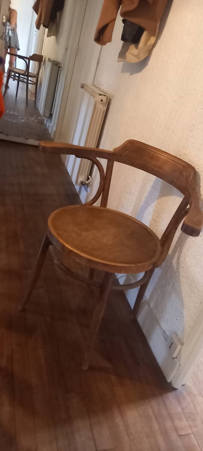 Curved wood armchair