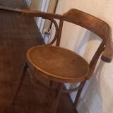 Curved wood armchair