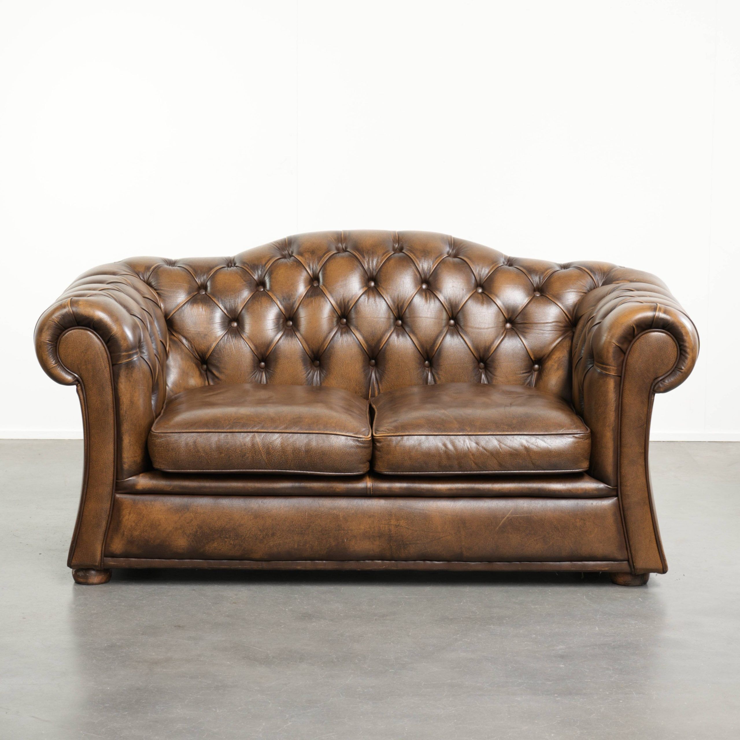 English cowhide leather Chesterfield 2-seater sofa in a luxurious colour