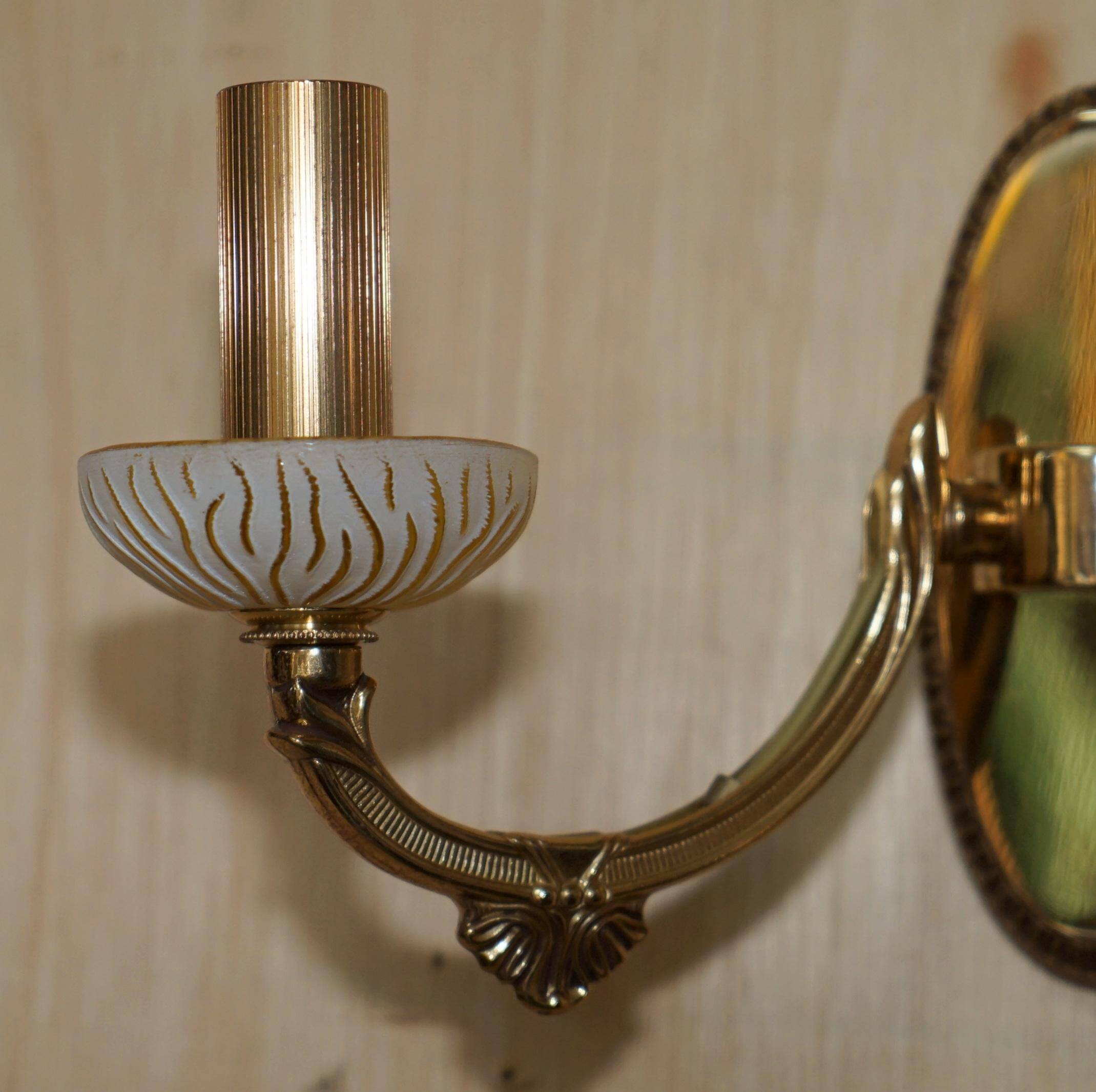Reccagni wall light pair in brass and frosted glass.