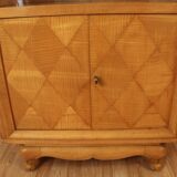 Art deco showcase in waved sycamore
