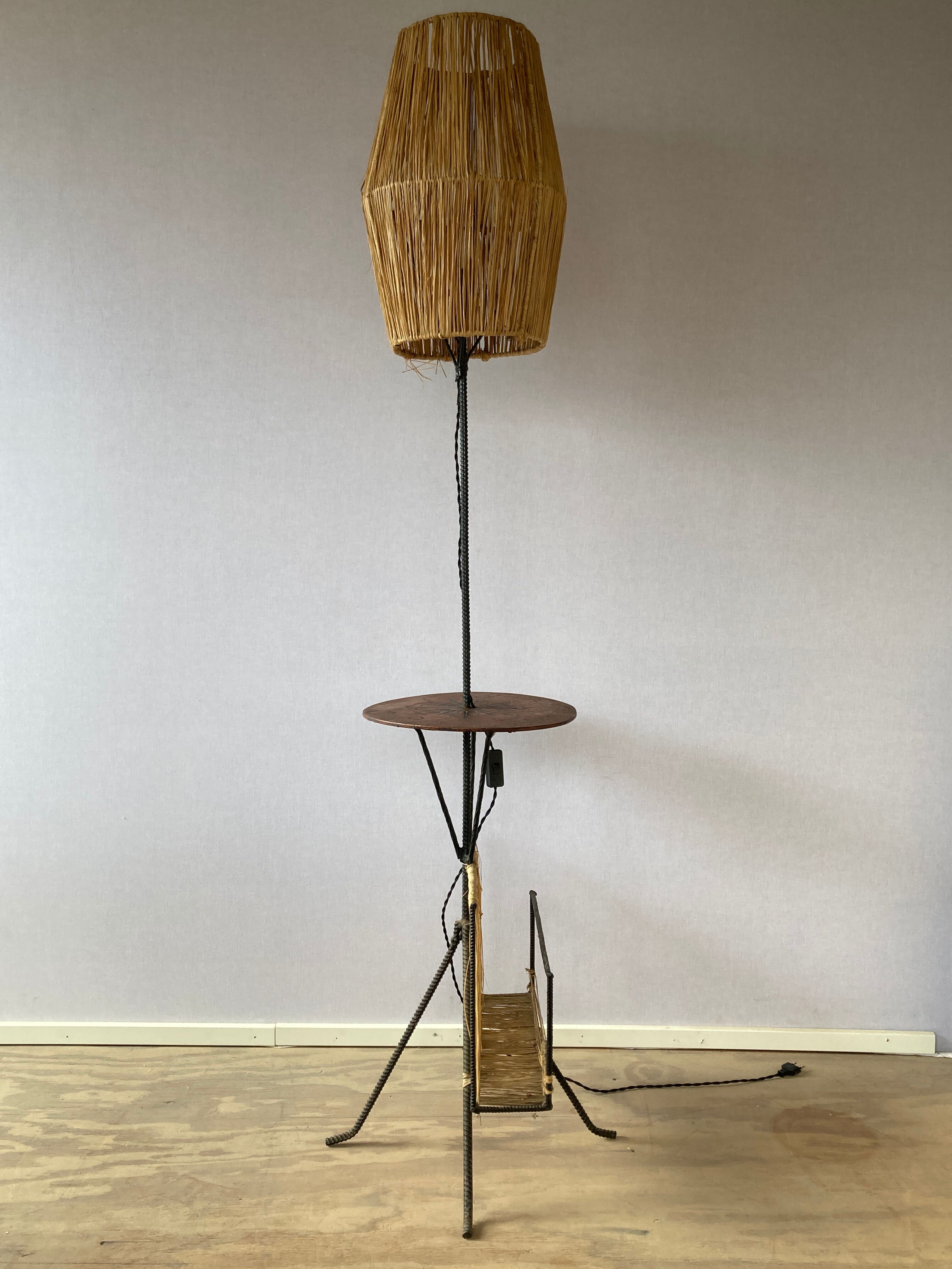 Wrought iron floor lamp with magazine holder and sisal shade, 1950s