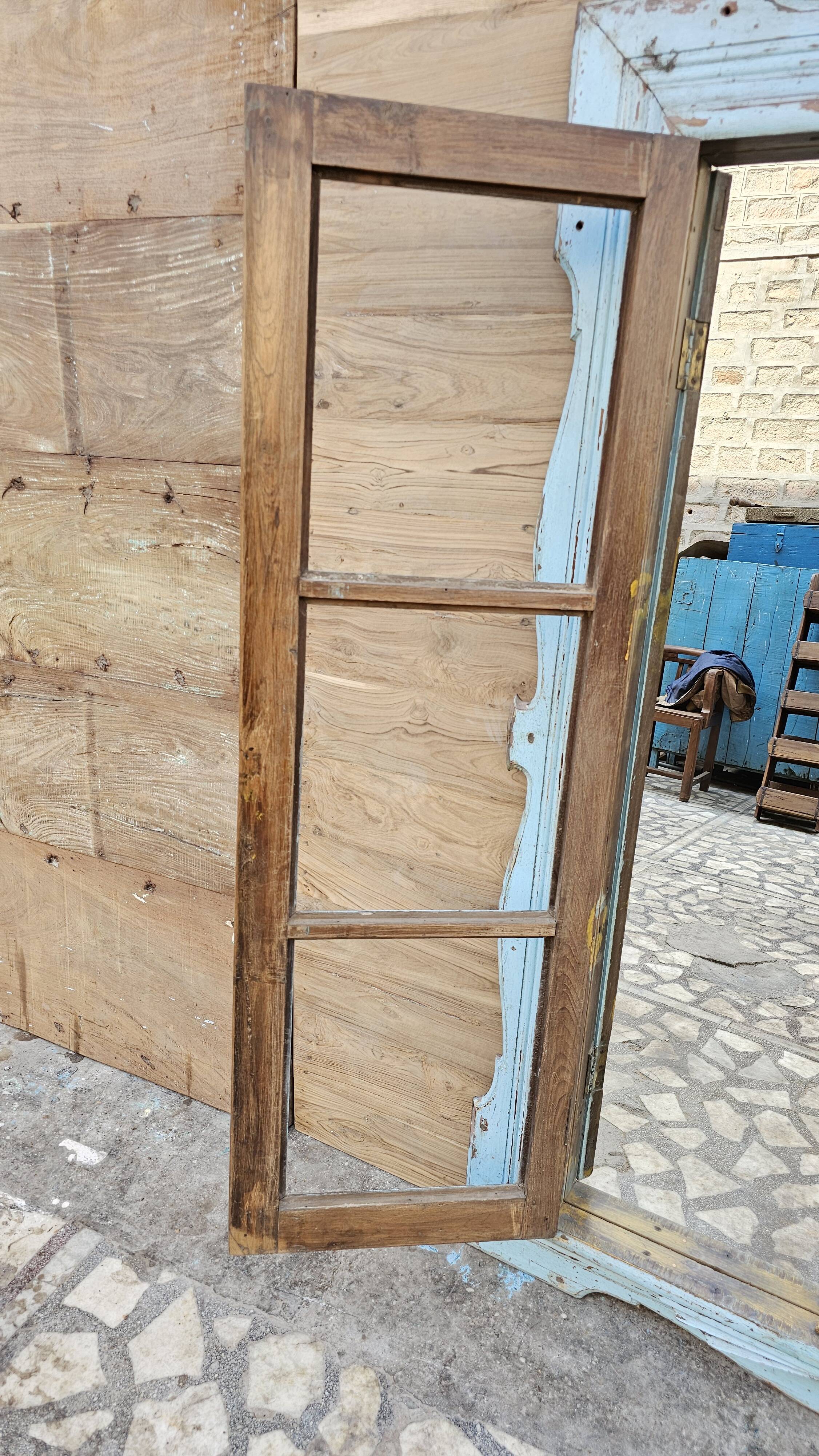 Art Deco mirror in Burmese teak
