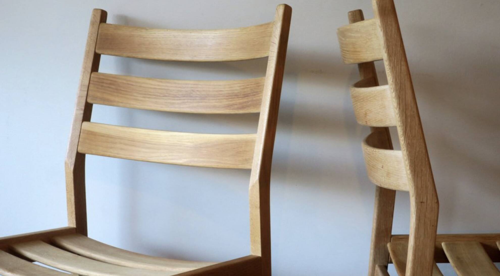 Pair of solid ash wide-seat dining chairs by Kurt Ostervig for KP Mobler, Denmark 1950s