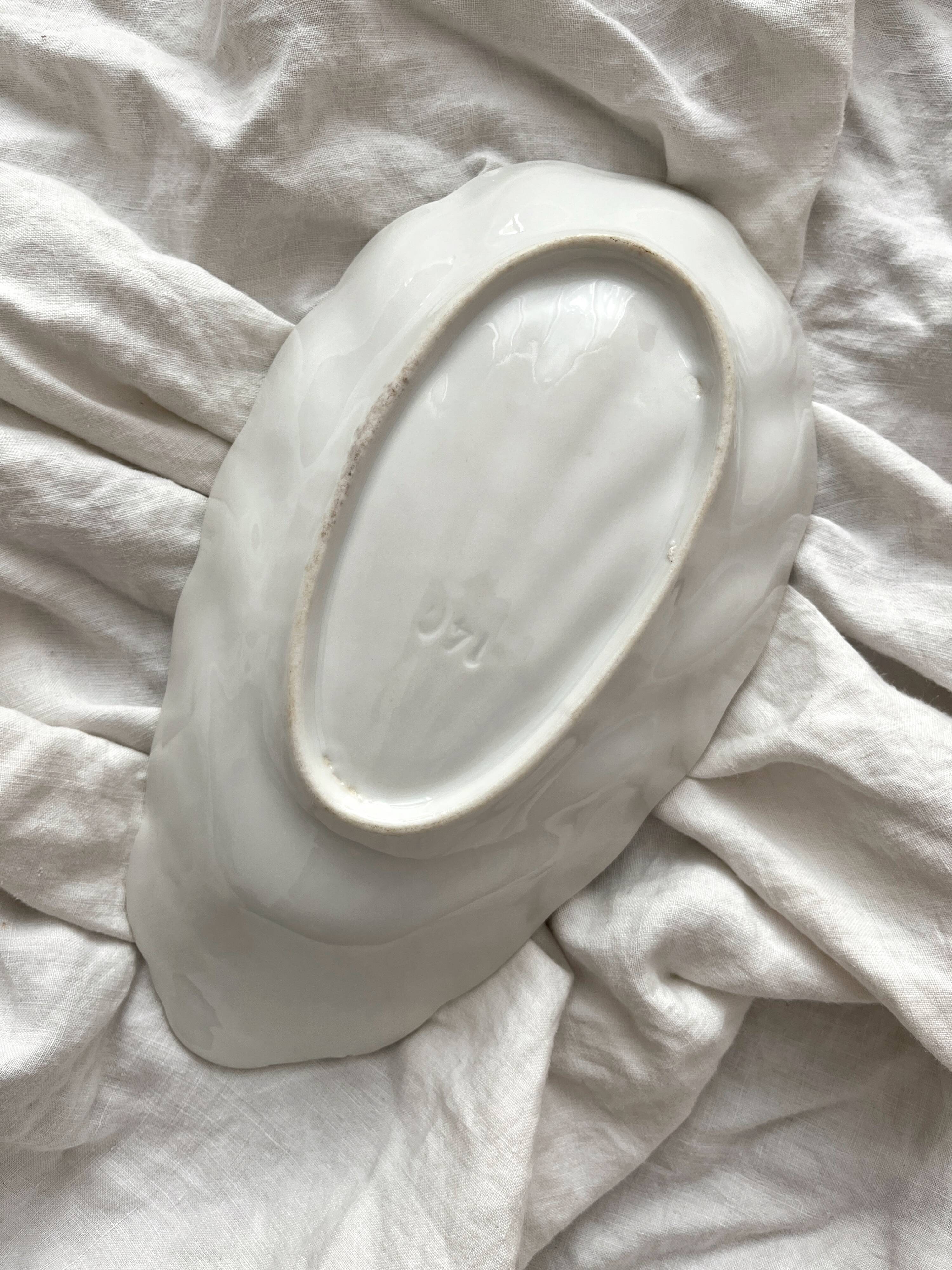 Small shell dish in old porcelain