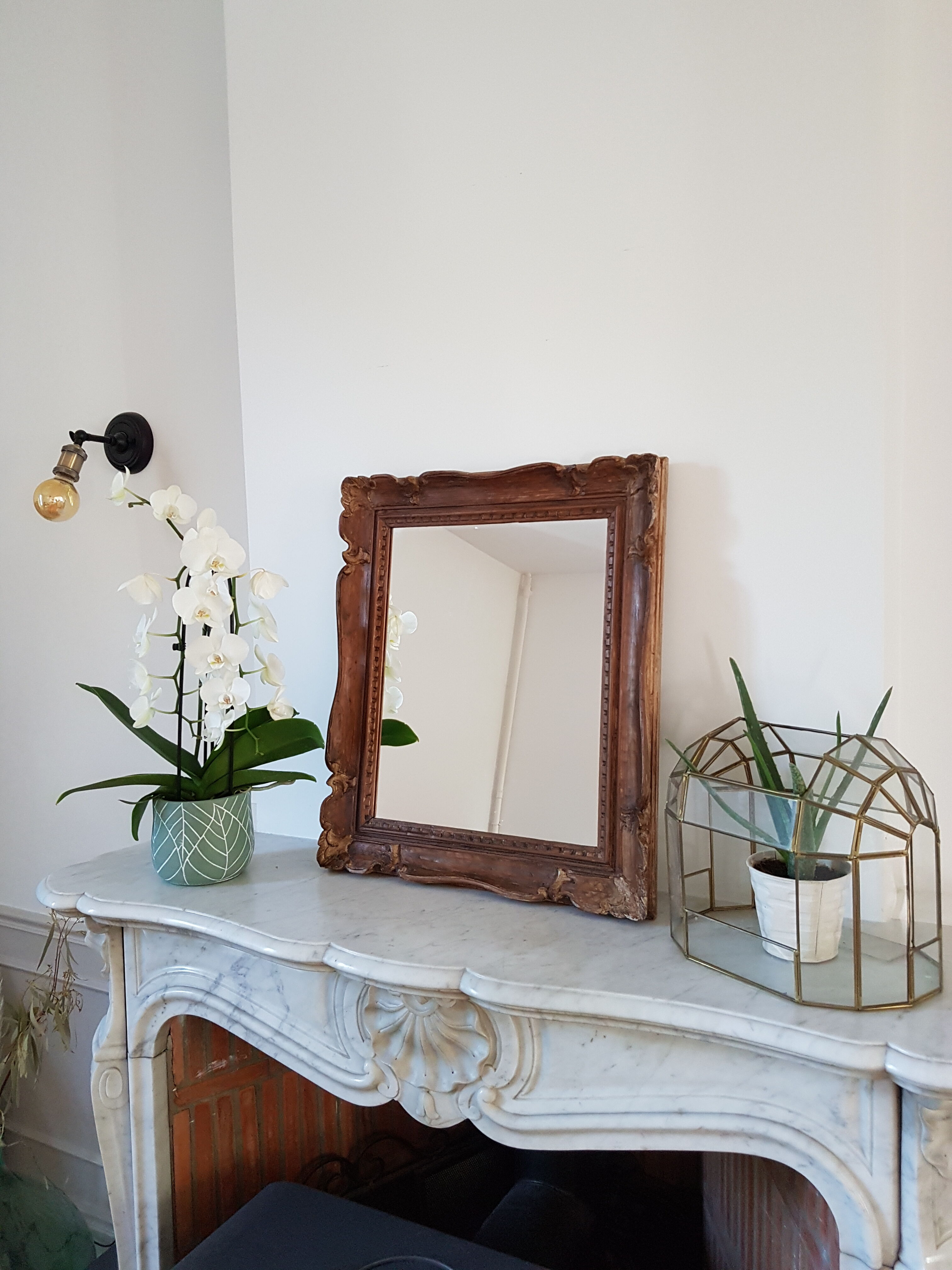 Carved wooden mirror