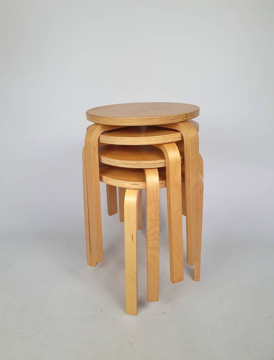Pair of vintage Ikea "Frosta" curved wooden stools