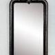 Old wooden mirror in Baroque or Napoleonic style