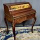 Louis XV style cylinder desk with gilded bronze mounts.